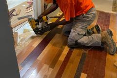 nailing-hardwood-floor-with-nailgun