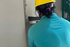 yca-student-fixing-drywall