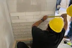 yca-student-measuring-tiles