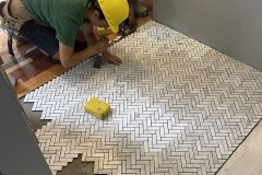 yca-students-fixing-tiles